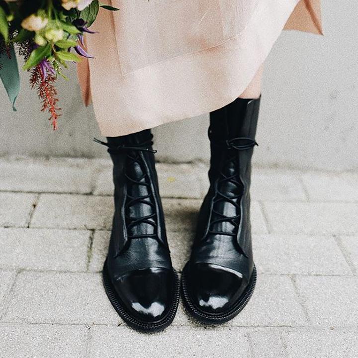 Women's knee-high lace-up boots with almond toes and low heels