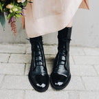 Women's knee-high lace-up boots with almond toes and low heels