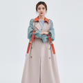 Women's beige colourblock trench coat with blue-grey sleeves and orange contrast panels