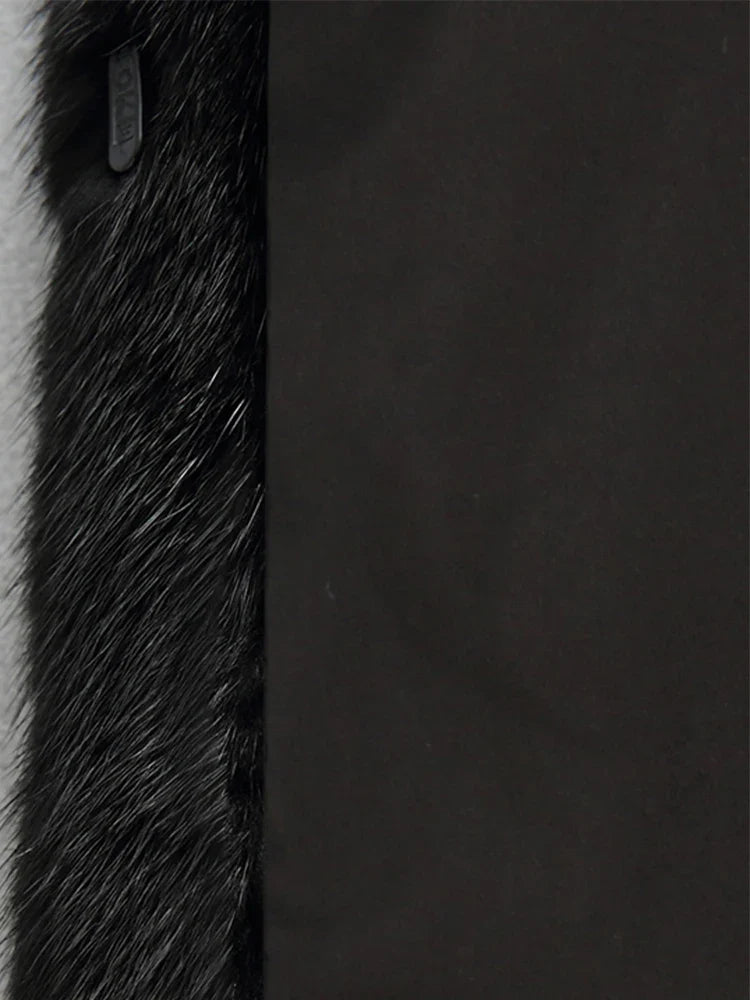 Women's black faux fur hooded coat with long sleeves and flared mid-calf shape