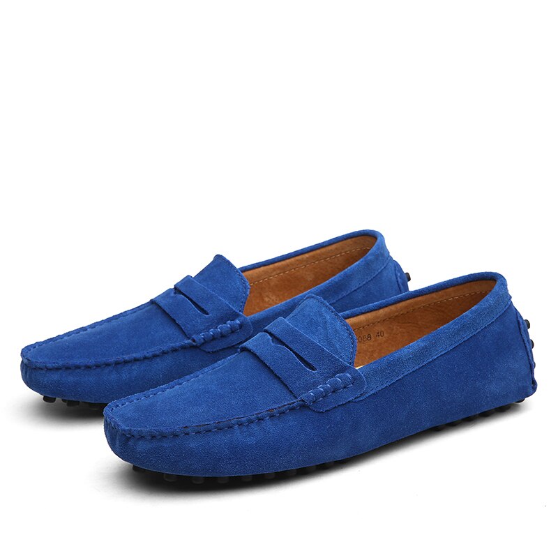 Men's low-profile loafers with moc toe and vamp strap detail