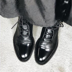 Women's tall lace-up boots with almond toes and contrasting toe caps