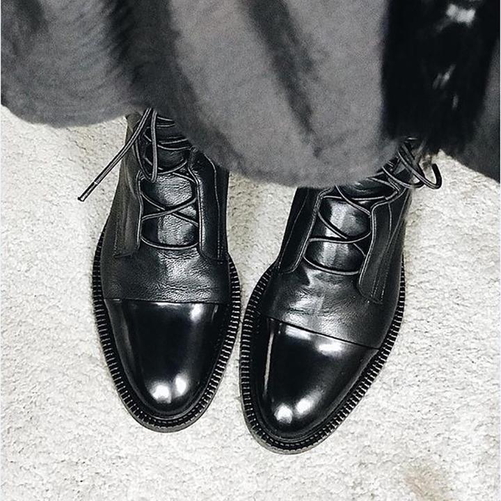 Women's tall lace-up boots with almond toes and contrasting toe caps