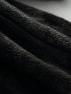 Women's black faux fur hooded coat with long sleeves and flared mid-calf shape