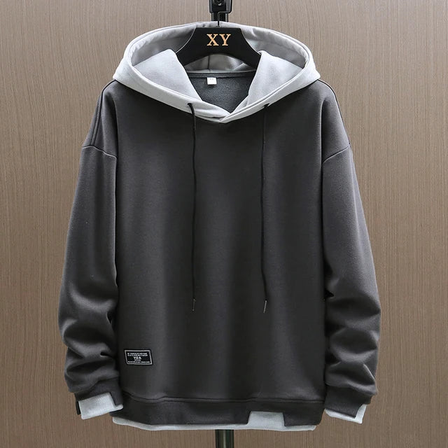 Men's two-tone pullover hoodie with drawstring hood and long sleeves