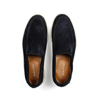 Black men's moccasin loafers with rounded toes and light flat soles