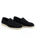 Black men's moccasin loafers with rounded toes and light flat soles
