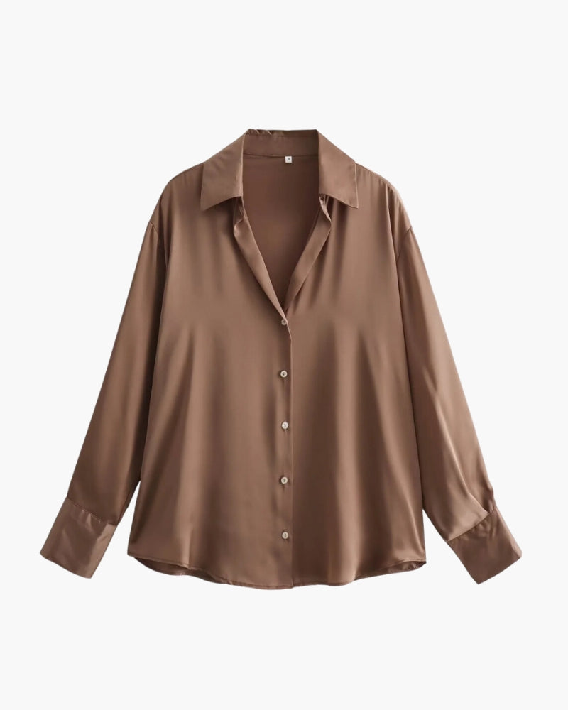 Women's long sleeve collared shirt with button front and wide cuffs