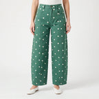 Women's high-waist barrel leg jeans with contrasting polka dots