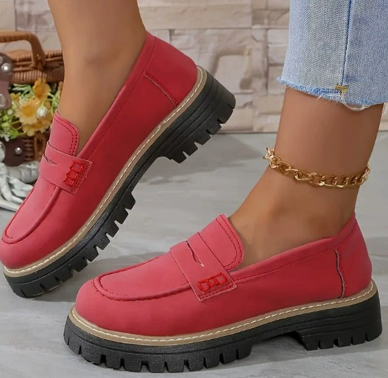 Women's slip-on loafers with rounded toes, low heels and textured soles