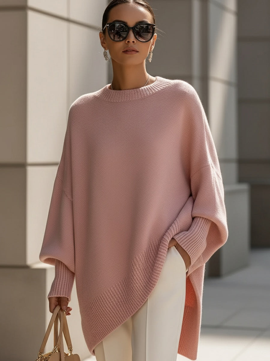 Women's oversized knitted jumper with crew neck, long sleeves and asymmetric hem