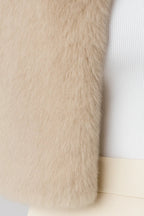 Women's cropped textured jacket with round neckline and long sleeves