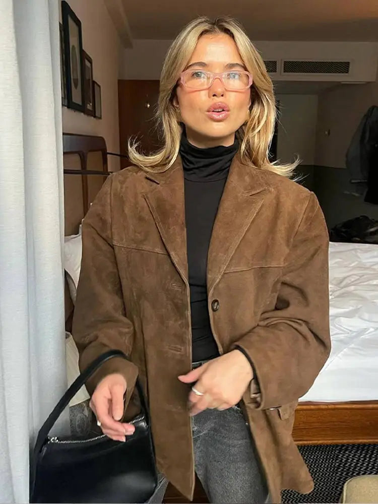 Women's brown oversized blazer with shaped shoulders and notched lapels