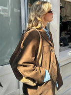 Women's brown oversized blazer with shaped shoulders and notched lapels