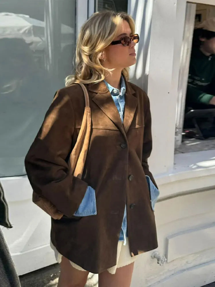 Women's brown oversized blazer with shaped shoulders and notched lapels