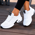Women's lace-up walking trainers with textured panels and contrasting soles