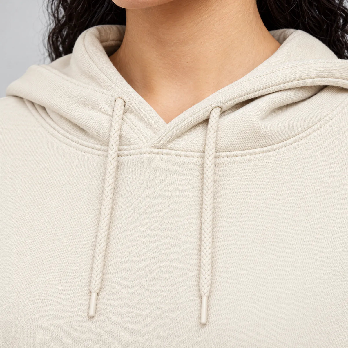 Women's oversized hooded hoodie with long sleeves and asymmetric hem