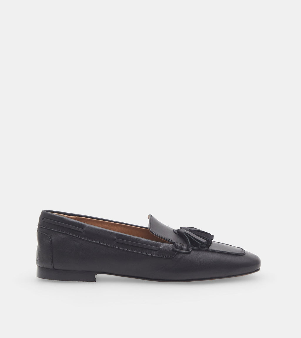 Women's black slip-on loafers with tassel detailing and low heels