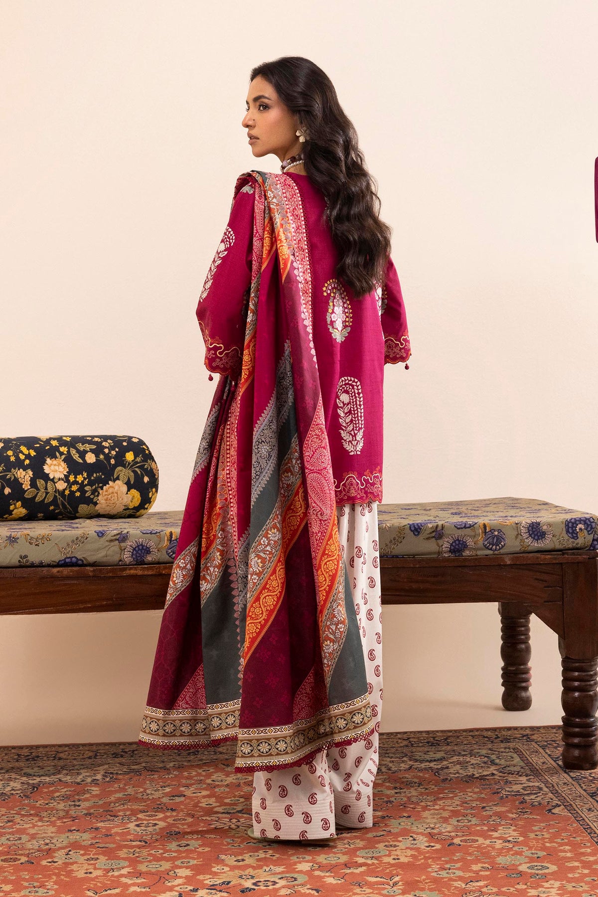 Women's printed three piece suit with burgundy tunic, patterned dupatta and paisley trousers
