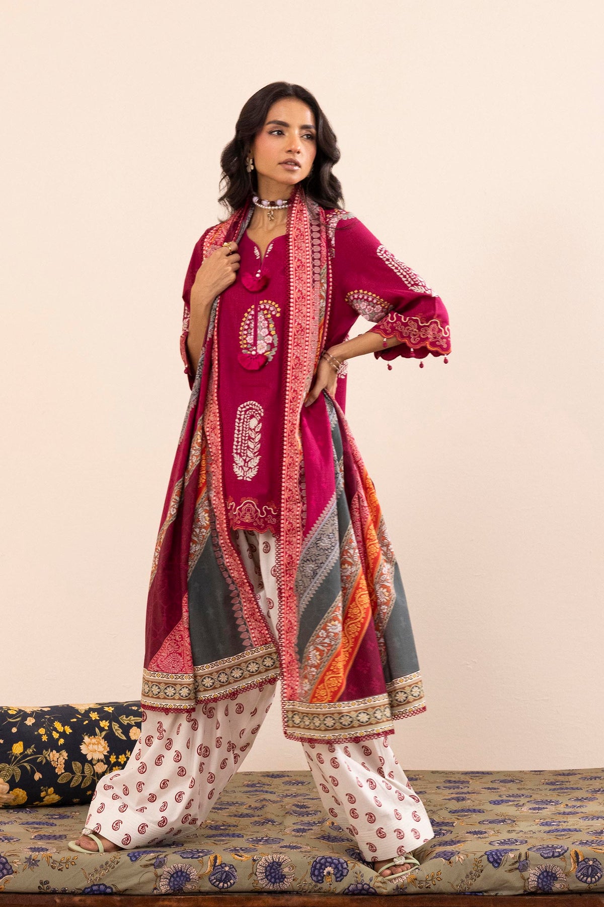 Women's printed three piece suit with burgundy tunic, patterned dupatta and paisley trousers