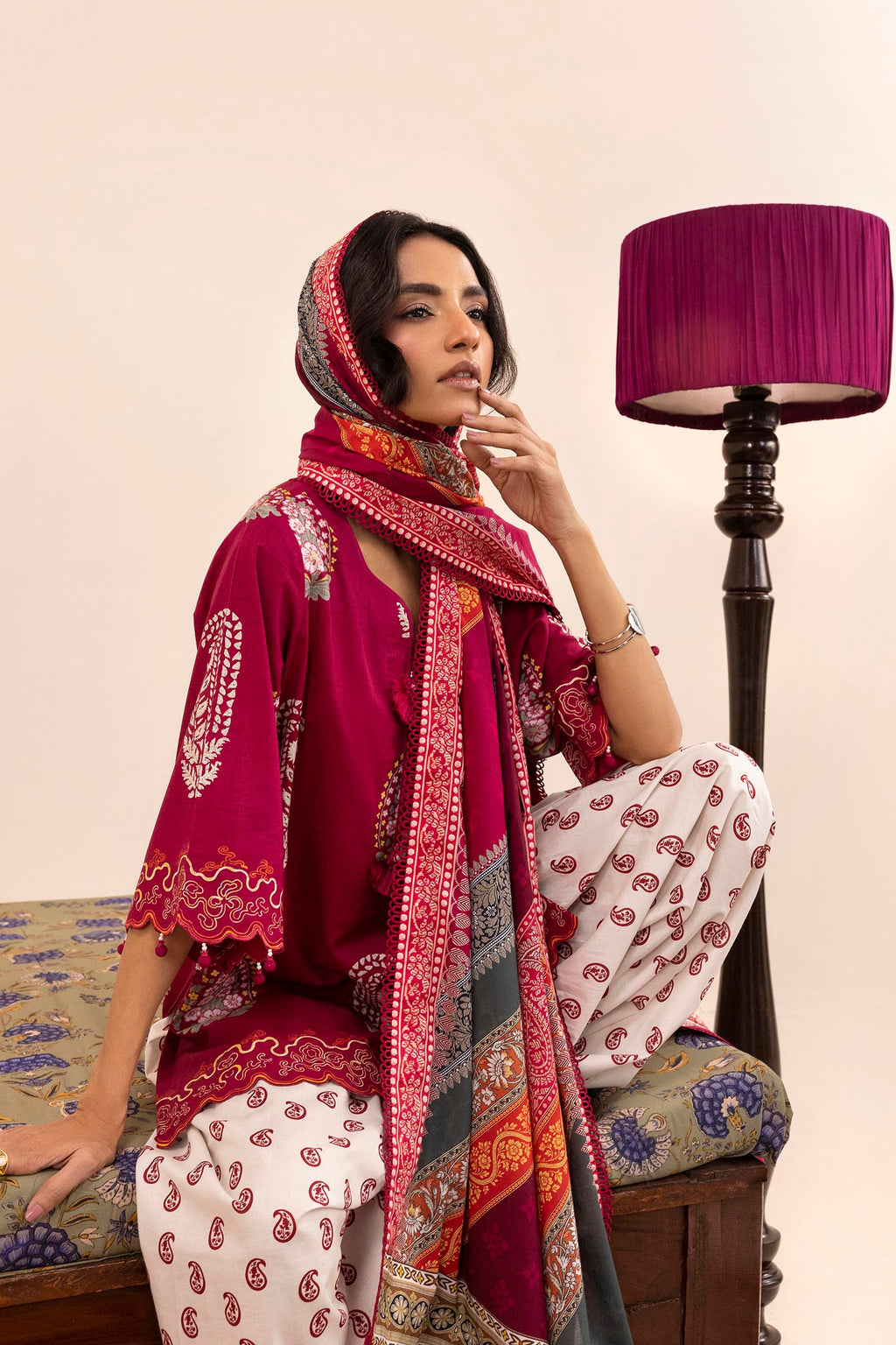 Women's printed three piece suit with burgundy tunic, patterned dupatta and paisley trousers