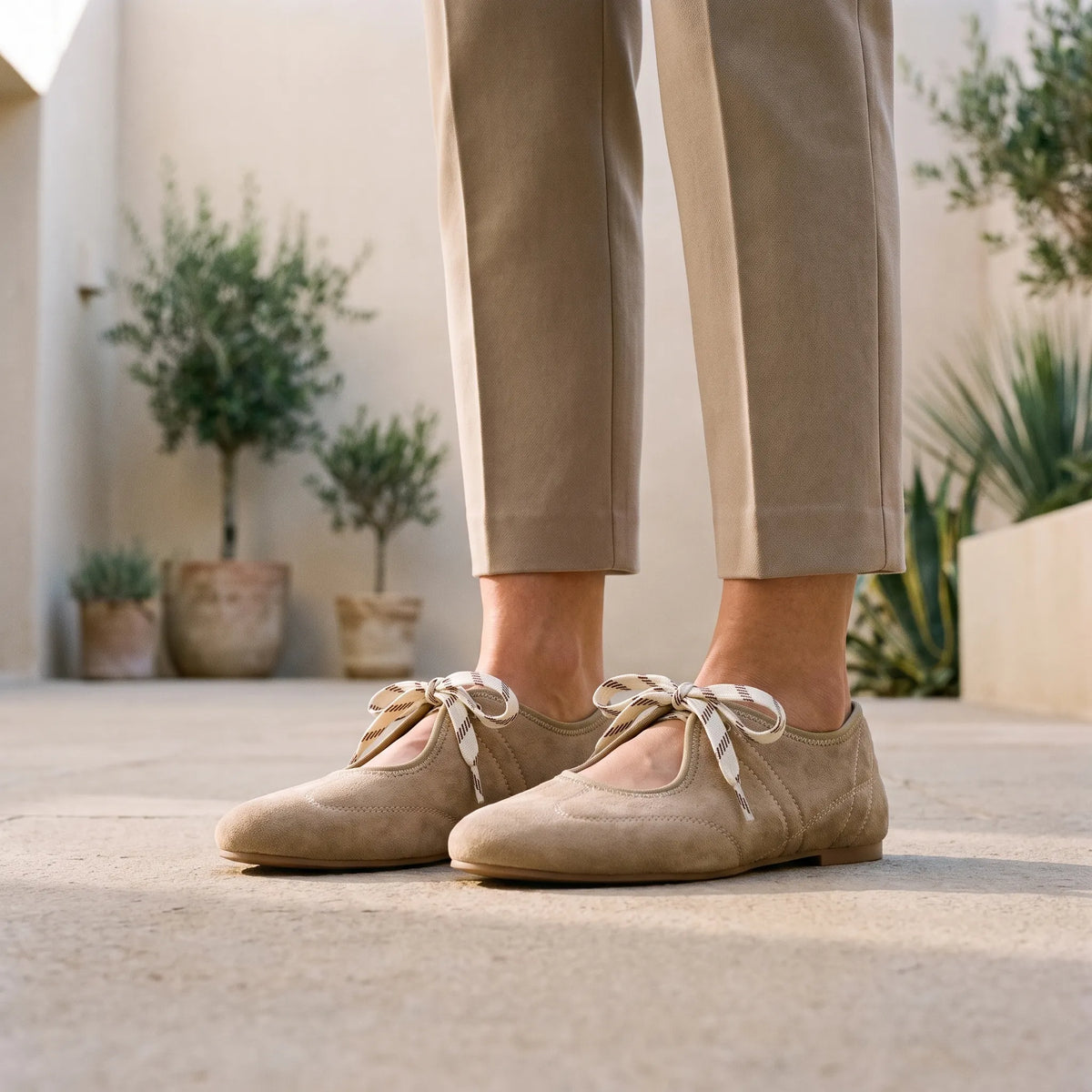 Women's beige lace-up ballet flats with round toes and flat heels