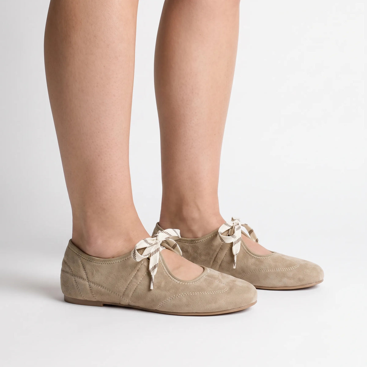 Women's beige lace-up ballet flats with round toes and flat heels