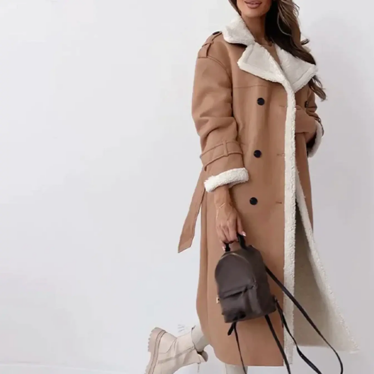 Women's long double-breasted coat with textured shearling-style collar and trim