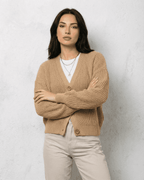 Women's beige ribbed V-neck cardigan with long sleeves and button fastening