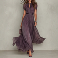 Women's purple chiffon maxi dress with high neckline, short puff sleeves and flowing full-length skirt