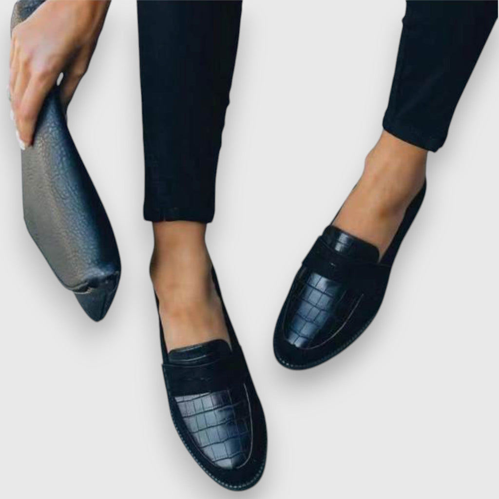 Women's black croc-effect slip-on loafers with rounded toes and low soles