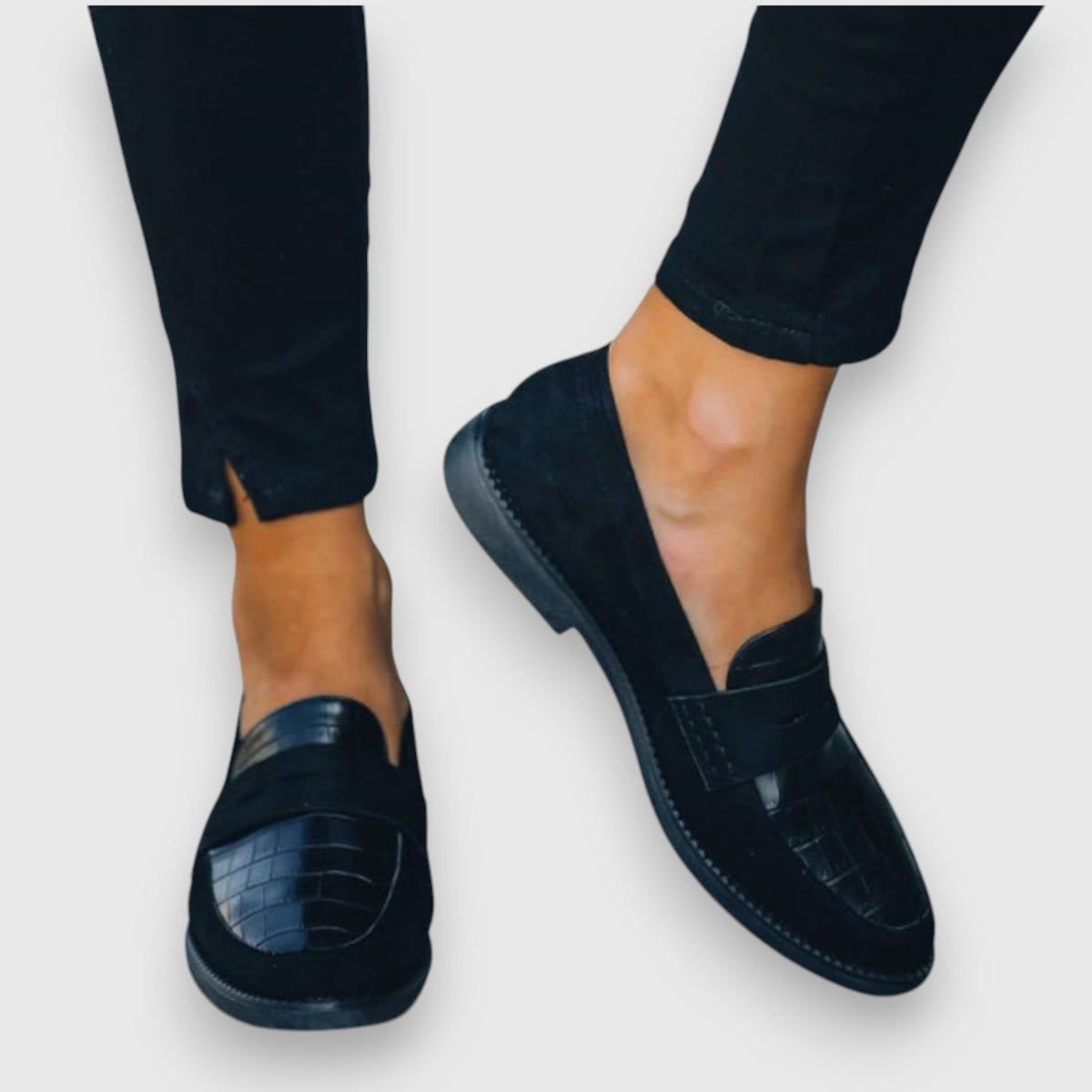 Women's black croc-effect slip-on loafers with rounded toes and low soles