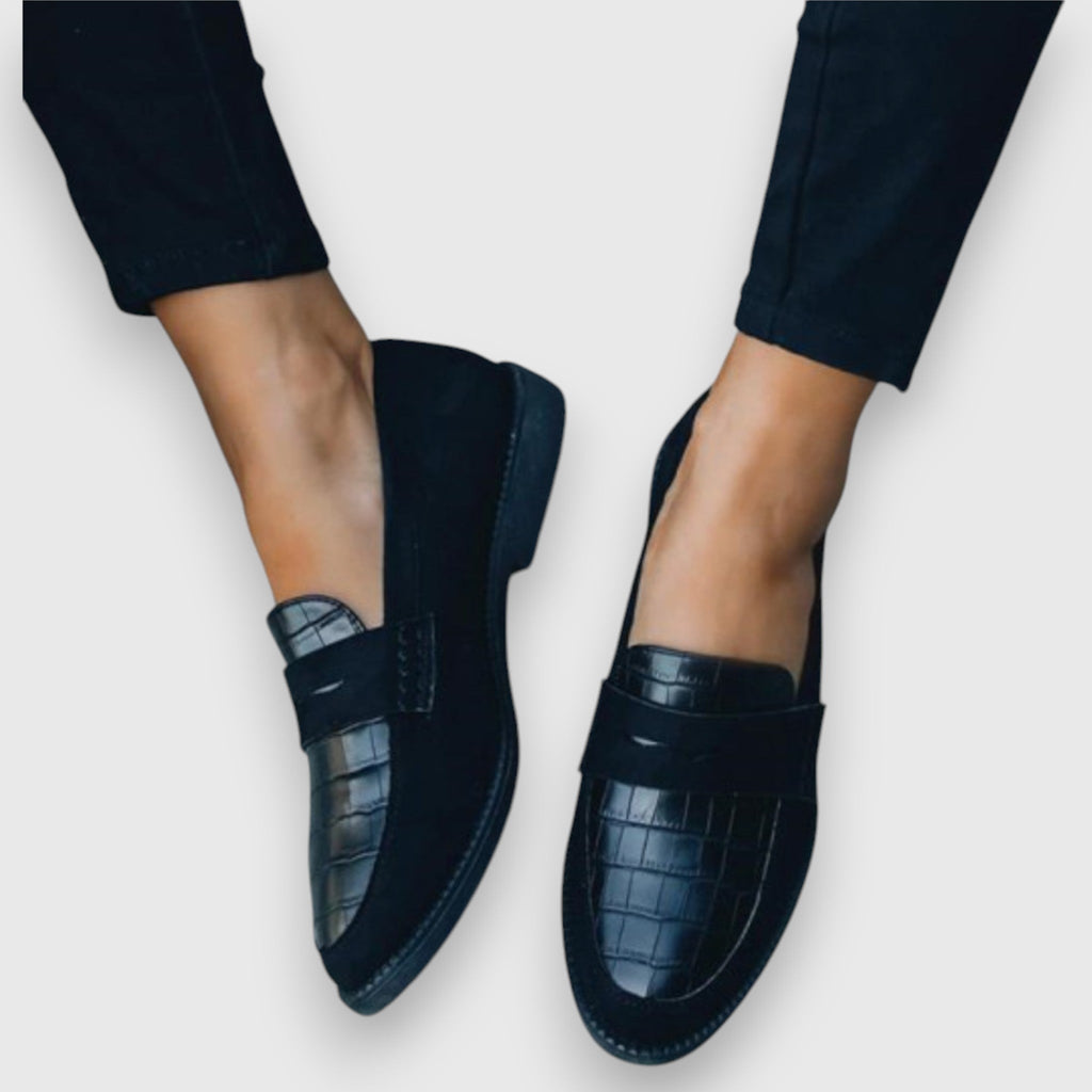 Women's black croc-effect slip-on loafers with rounded toes and low soles
