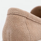 Women's beige textured penny loafers with flat soles
