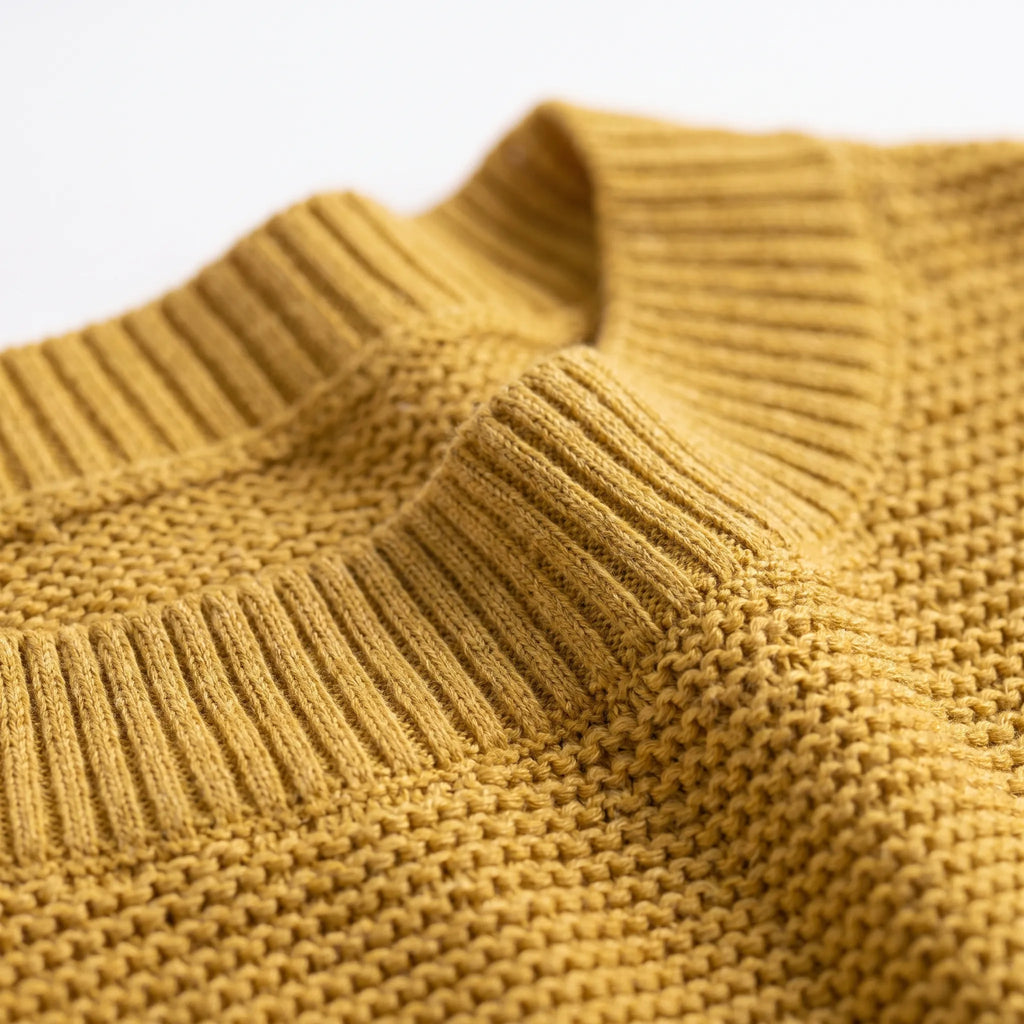 Women's textured crochet jumper with boat neckline and three-quarter sleeves