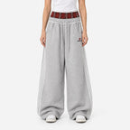 Women's wide-leg jogger trousers with double waistband and side stripes