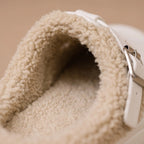 Women's plush-lined slip-on house shoes with buckle straps and thick platform soles