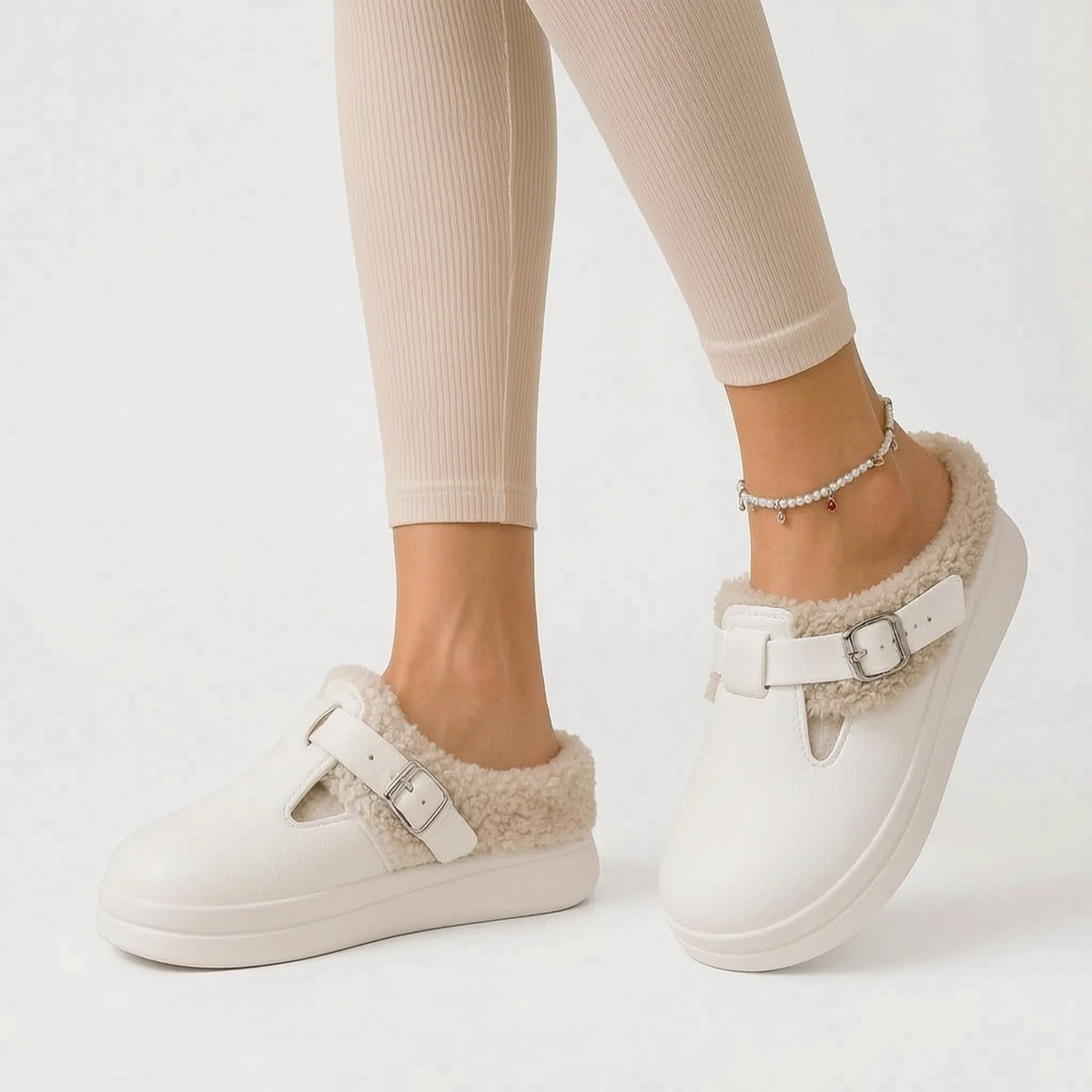 Women's plush-lined slip-on house shoes with buckle straps and thick platform soles