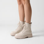 Women's lace-up platform combat boots with side zips and lug soles