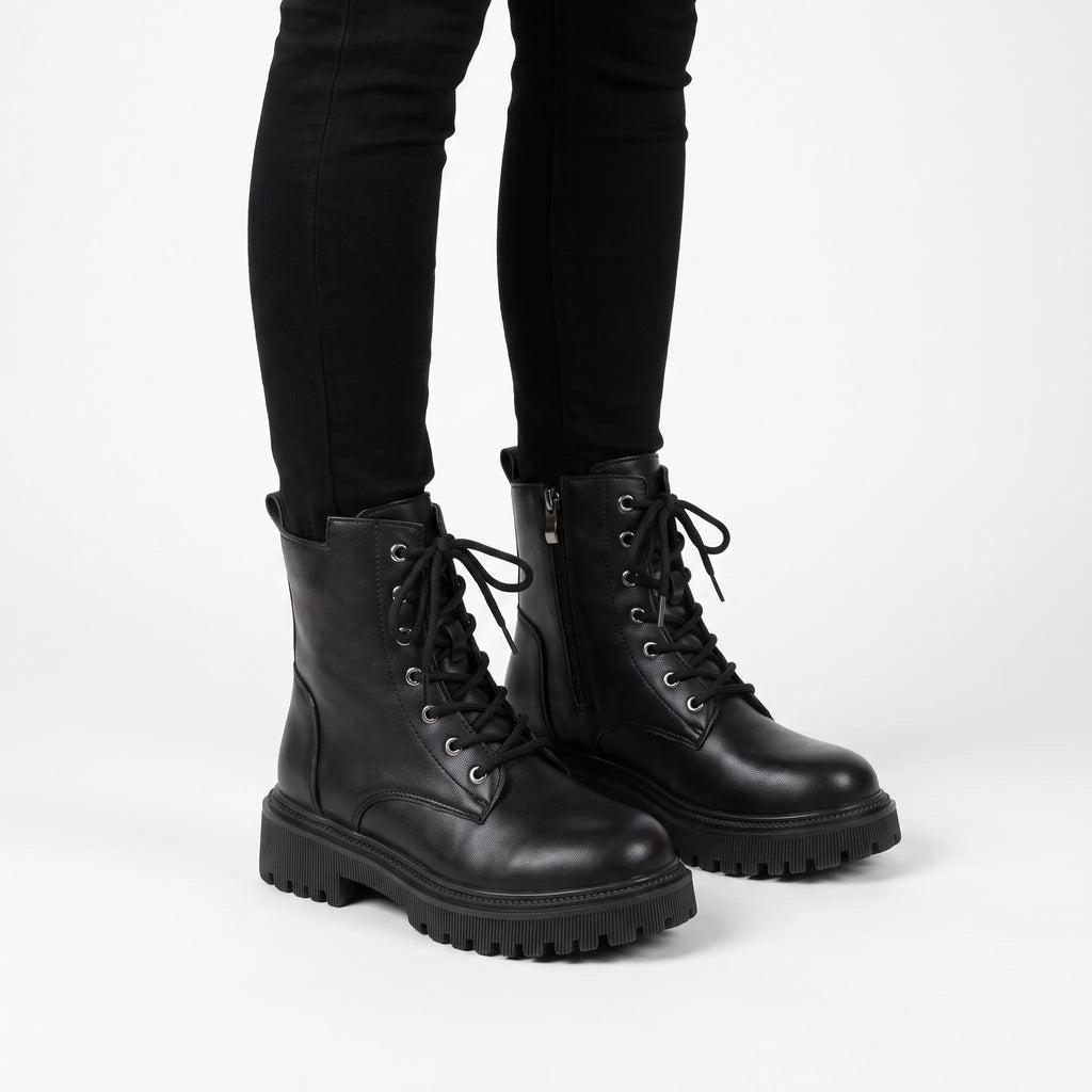 Women's lace-up platform combat boots with side zips and lug soles