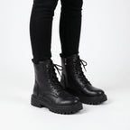 Women's lace-up platform combat boots with side zips and lug soles