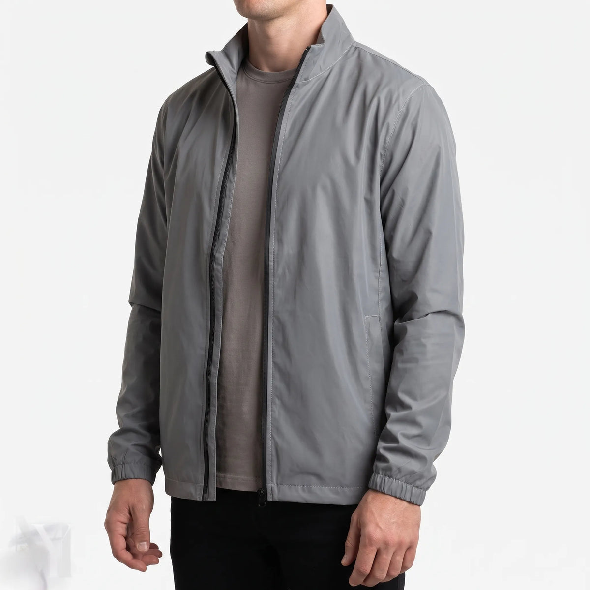 Men's grey reflective full-zip jacket with stand collar and zipped pockets