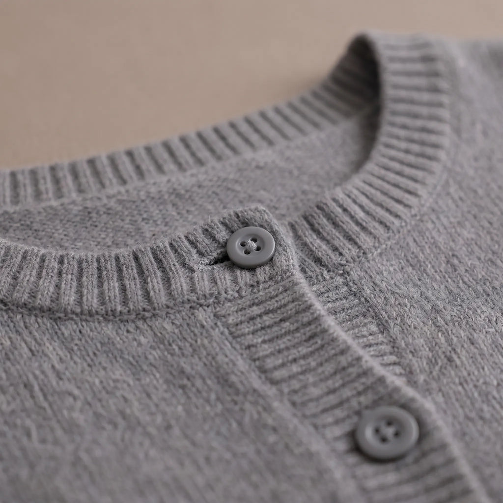 Women's grey fine knit cardigan with round neck and button front