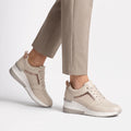Women's lace-up wedge trainers with perforated panels and raised soles