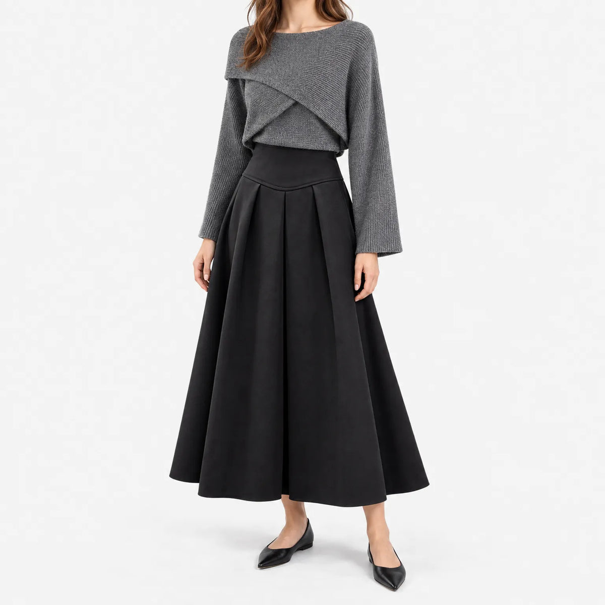 Women's two-piece outfit with crossover knit top and flared midi skirt