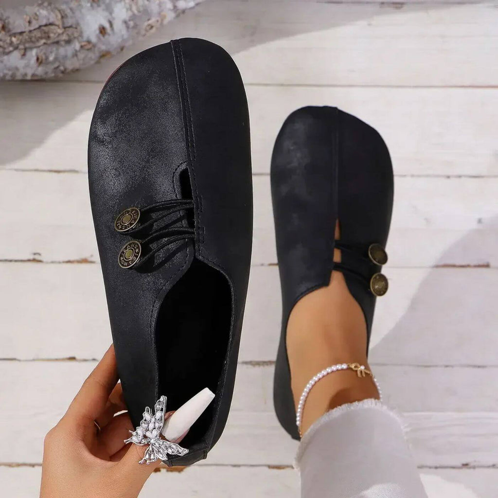 Women's flat slip-on shoes with elastic lace detail and round buttons