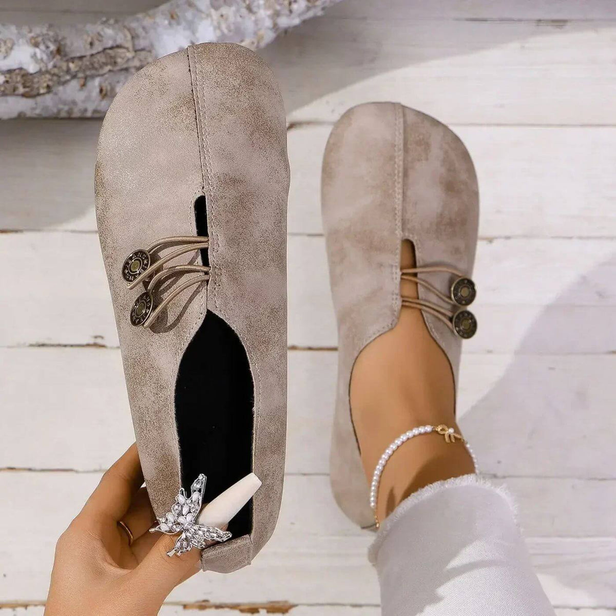 Women's flat slip-on shoes with elastic lace detail and round buttons