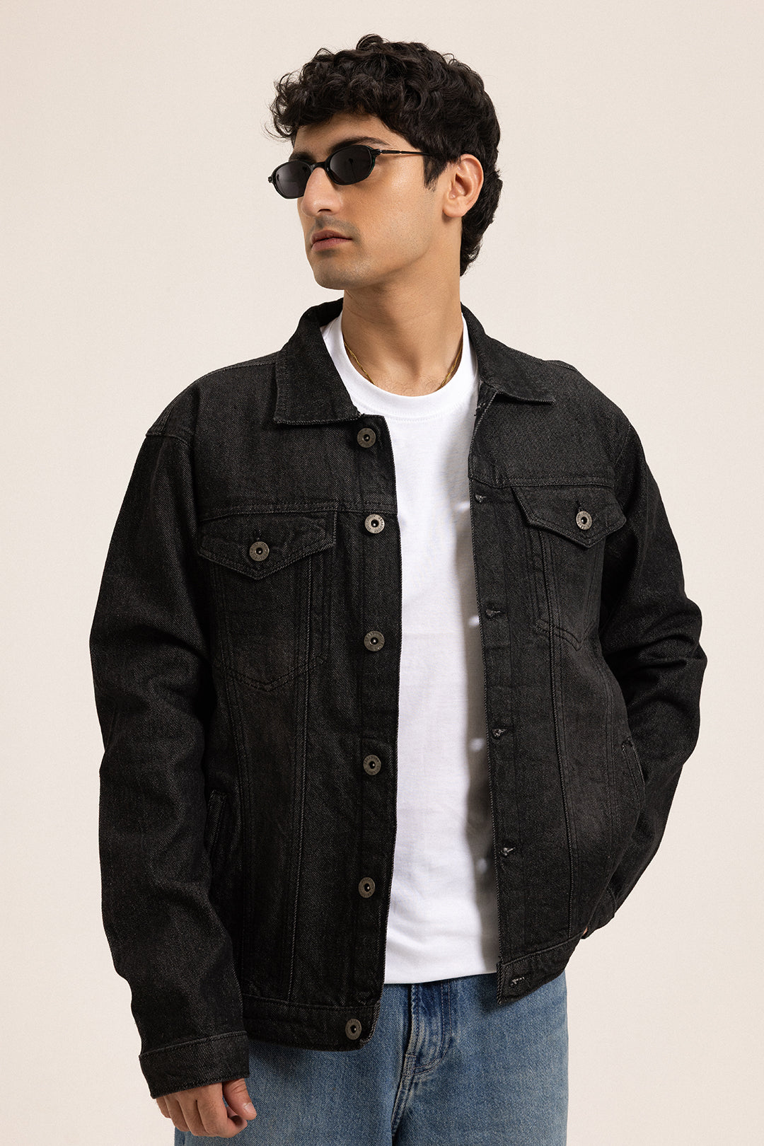 Men's black button front jacket with pointed collar and flap chest pockets
