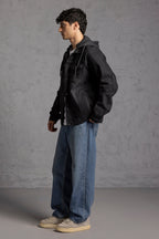 Men's black hooded denim jacket with button front and chest pockets