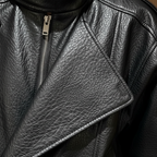Women's black biker jacket with high collar and asymmetric zip